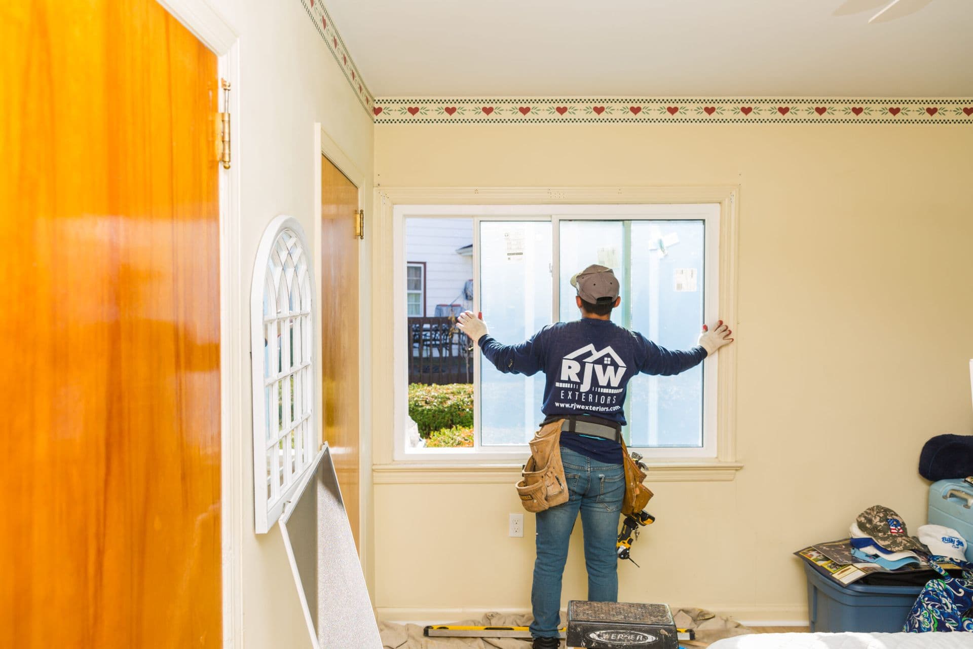 RJW-Installing-a-window-scaled-1.jpg